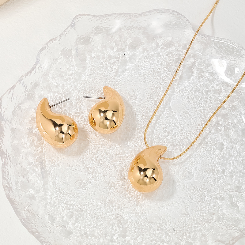 Teardrop Design Gold Plastic Earrings Set