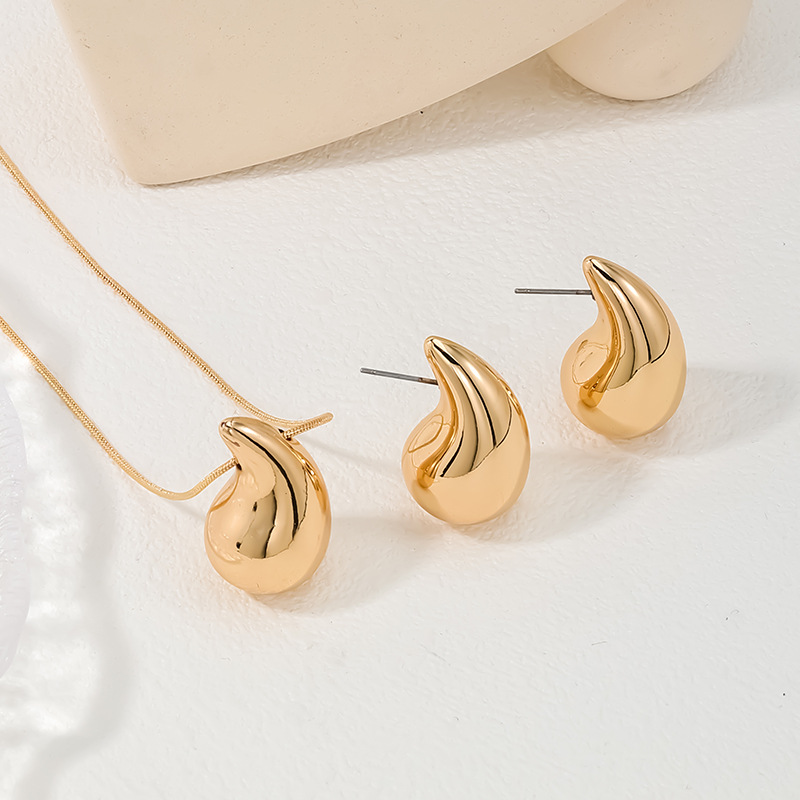Teardrop Design Gold Plastic Earrings Set