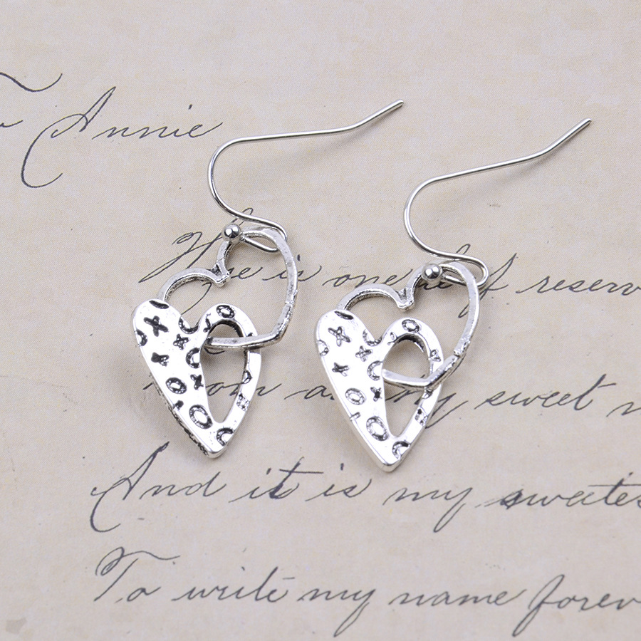 Silver Hollow Heart Design Alloy Earrings