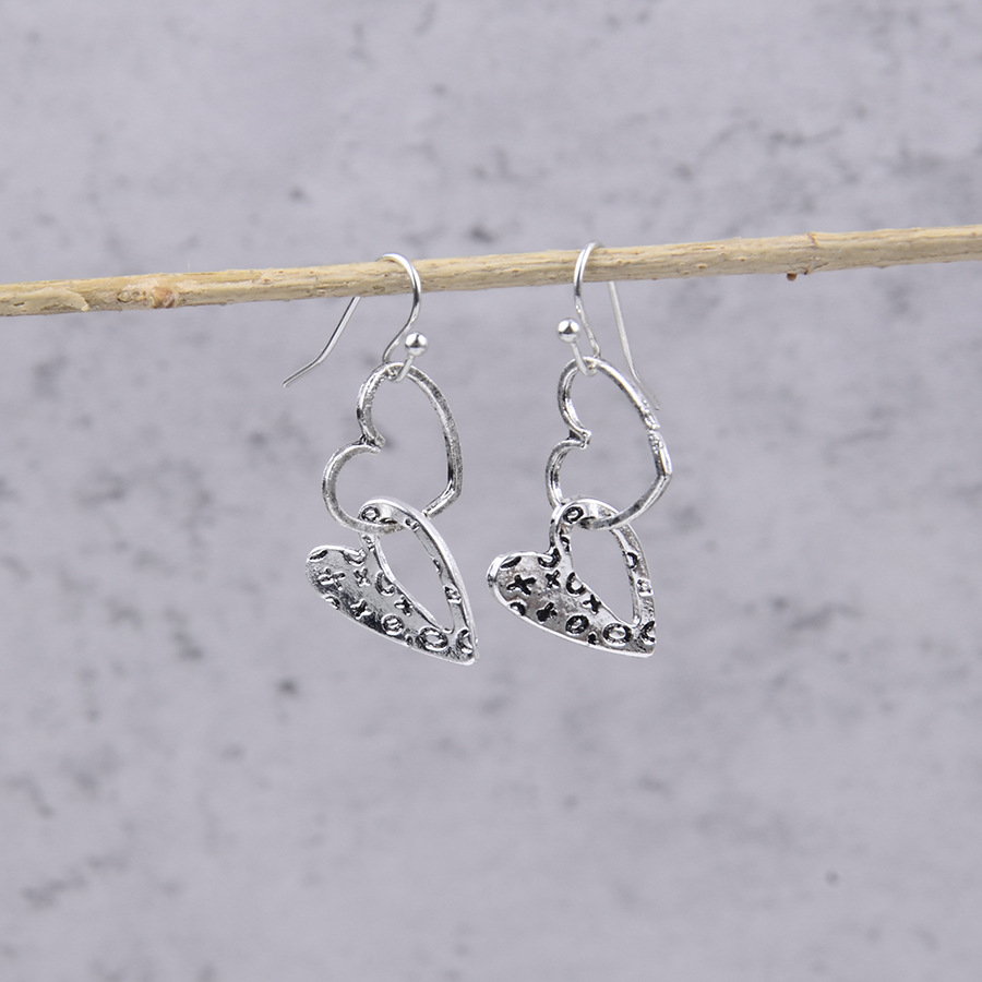 Silver Hollow Heart Design Alloy Earrings