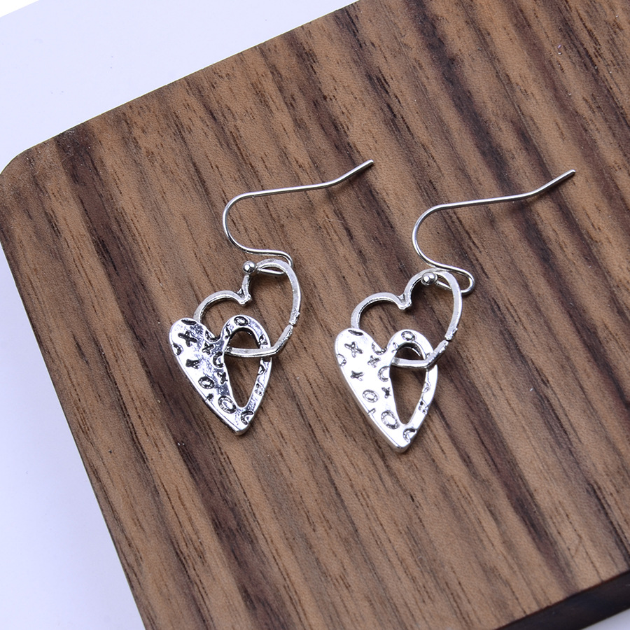 Silver Hollow Heart Design Alloy Earrings