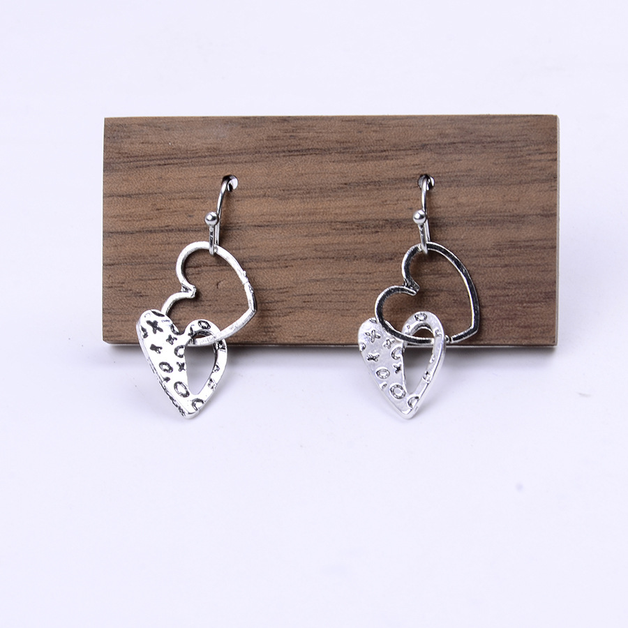 Silver Hollow Heart Design Alloy Earrings