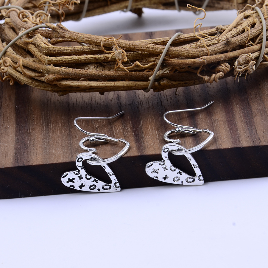 Silver Hollow Heart Design Alloy Earrings