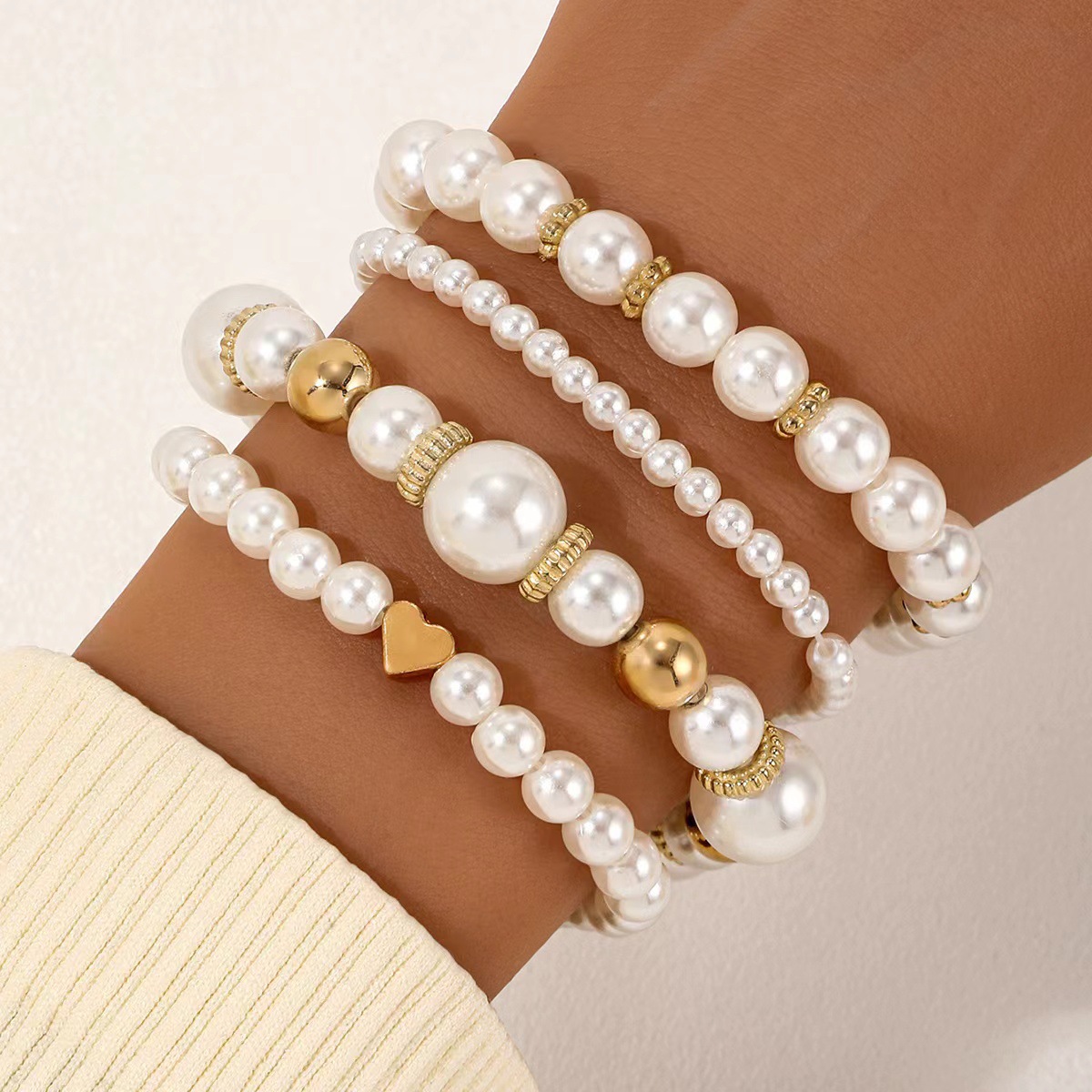 Golden Heart Design Round Pearl Bracelets